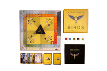 Load image into Gallery viewer, Board game titled 'A Game Called Birds' with components on a wooden surface