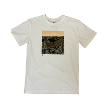 Load image into Gallery viewer, White tee shirt with a chair sitting in the mountains.