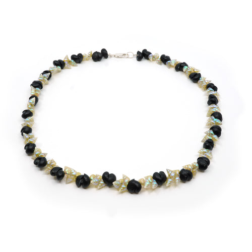 Maireener and black crow shell necklace with silver clasp.