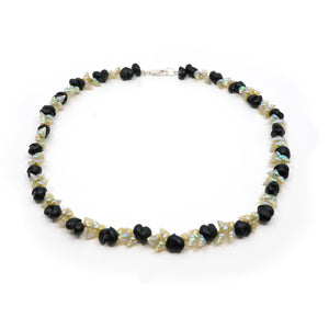 Maireener and black crow shell necklace with silver clasp.