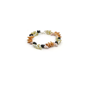  Maireener, white toothie, oat and black crow shell bracelet with silver clasp.