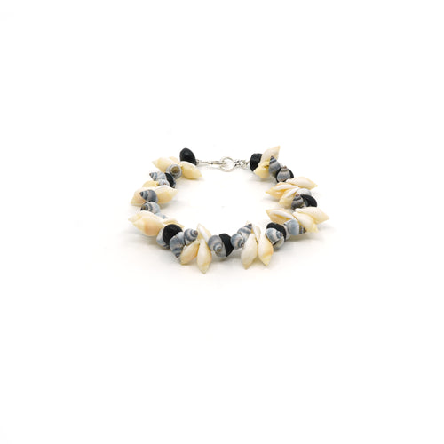 Penguin, grey gull and black crow shell bracelet with a silver clasp.
