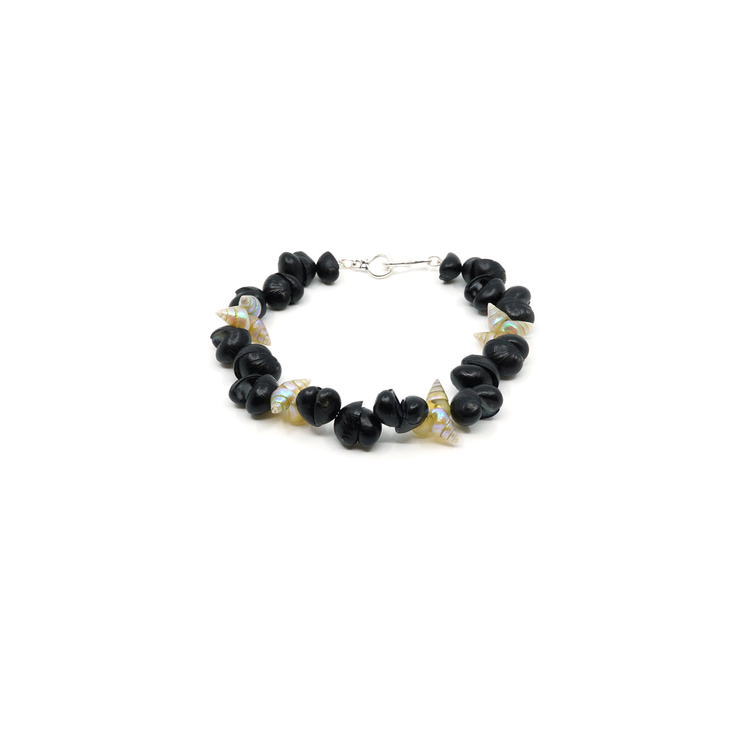 Maireener and black crow shell bracelet with silver clasp.