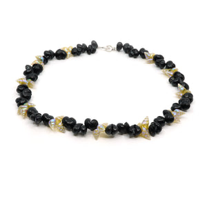 Maireener and black crow shell necklace with silver clasp.