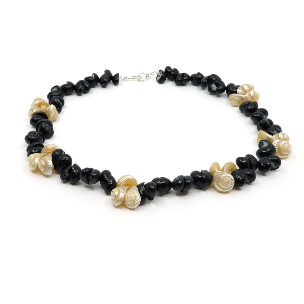 Jeanette James –  white button and black crow shell necklace