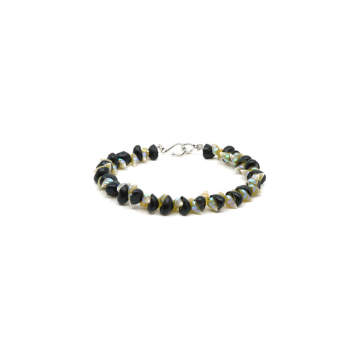 Maireener and black crow shell bracelet with silver clasp.