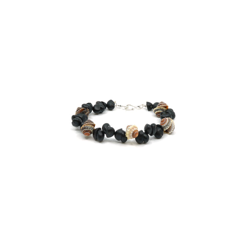 Brown button and black crow shell bracelet with silver clasp.