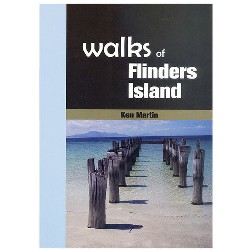 Book cover of 'Walks of Flinders Island' by Ken Martin with a scenic image of wooden posts in water.