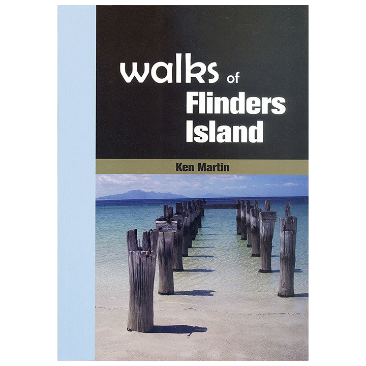 Book cover of 'Walks of Flinders Island' by Ken Martin with a scenic image of wooden posts in water.