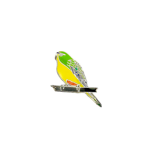 Yellow and green parrot enamel pin with orange spot on lower belly.