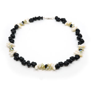 Maireener, penguin and black crow shell necklace with silver clasp.