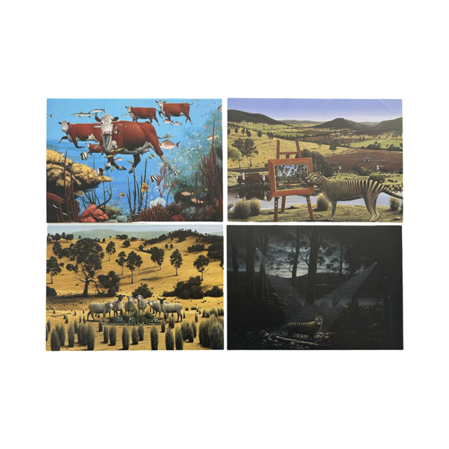 Images of cows, sheep and thylacines on postcards.