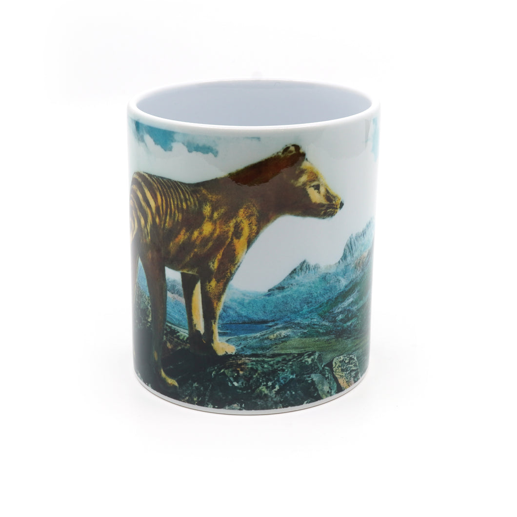 HJ King mug of a Thylacine looking towards Cradle Mountain, 1933 reproduction from hand-tinted glass lantern.