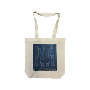 Calico tote bag with a blueprint image of a chair. 