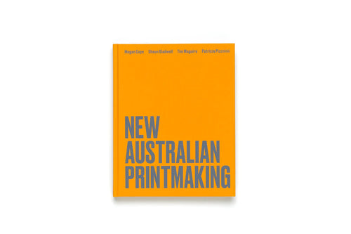 Yellow hardcover book with big grey printed words.