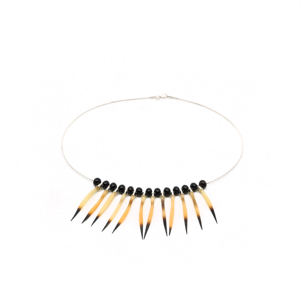 Echidna quill and bead necklace.