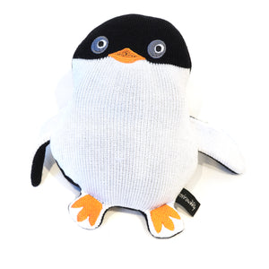 Penguin in knitted fabric with embroidered details.