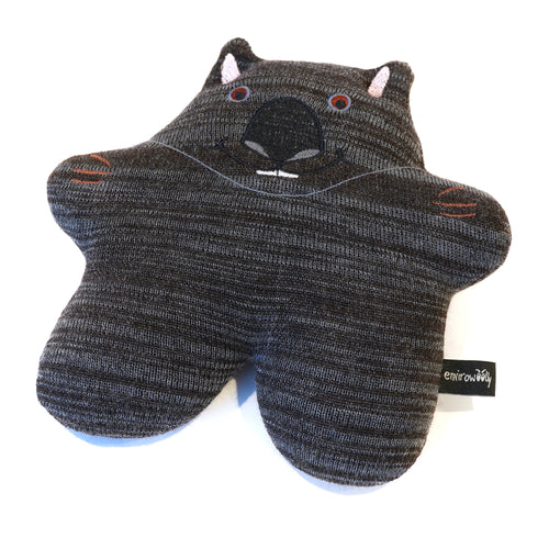 Wombat in knitted fabric with embroidered details.