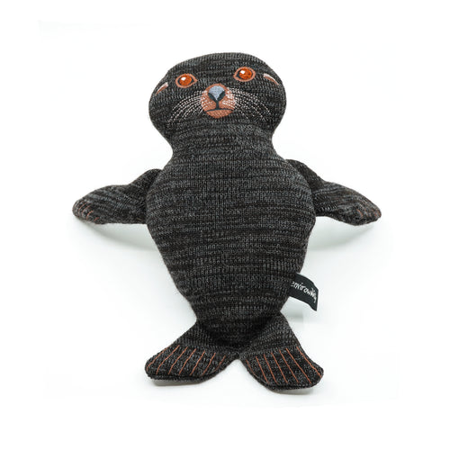 Plush seal made from knitted material with stitched features.