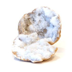 Cracked natural geode with white crystals. 