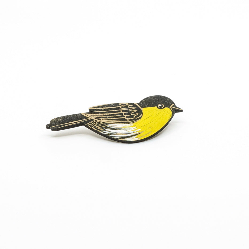 Yellow breasted painted wooden bird brooch.